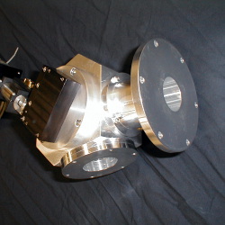 vacuum compatible grating predisperser